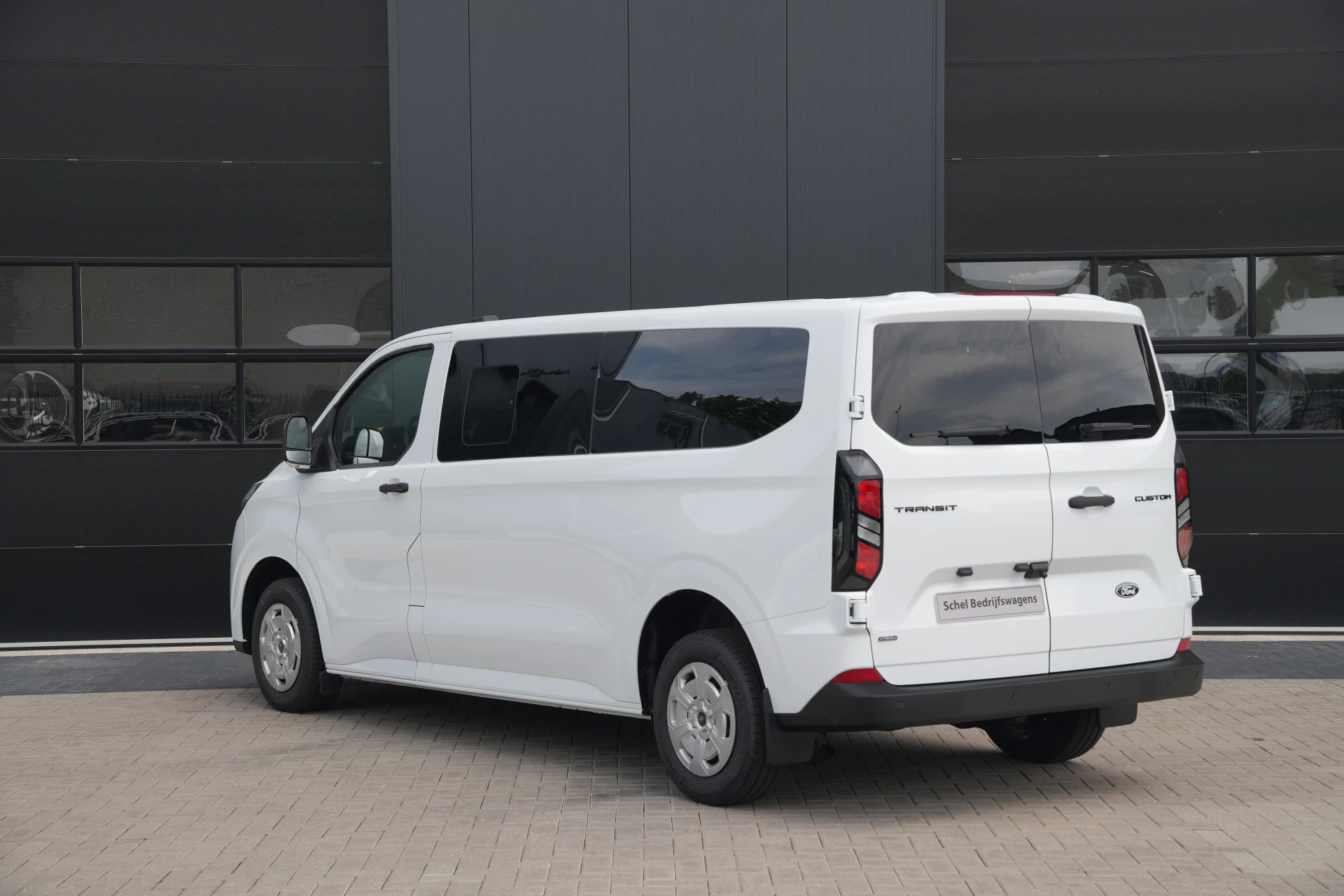 Ford Transit Custom 2026 - 340 2.5 PHEV L2H1 Kombi Trend 9 zits - Carplay - Camera - Navigatie - Airco achterin - Cuise - Rijklaar afbeelding 8