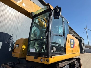 Cat N/A 2014 - M320F obrazek 7