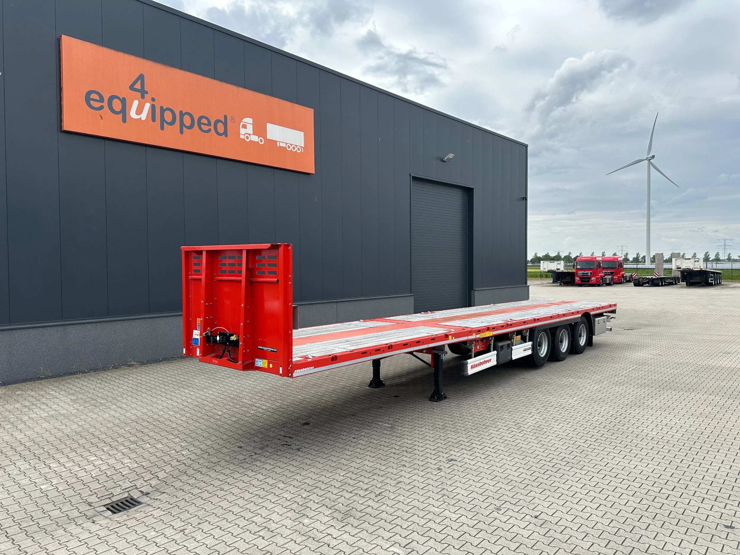 KAESSBOHRER 2026 - new and unused Heavy-Duty flatbed / 690cm extendable / steering axle / lift axle / twistlocks / timberstakes / NL-trailer / APK: 04-2027 zdjęcie 1