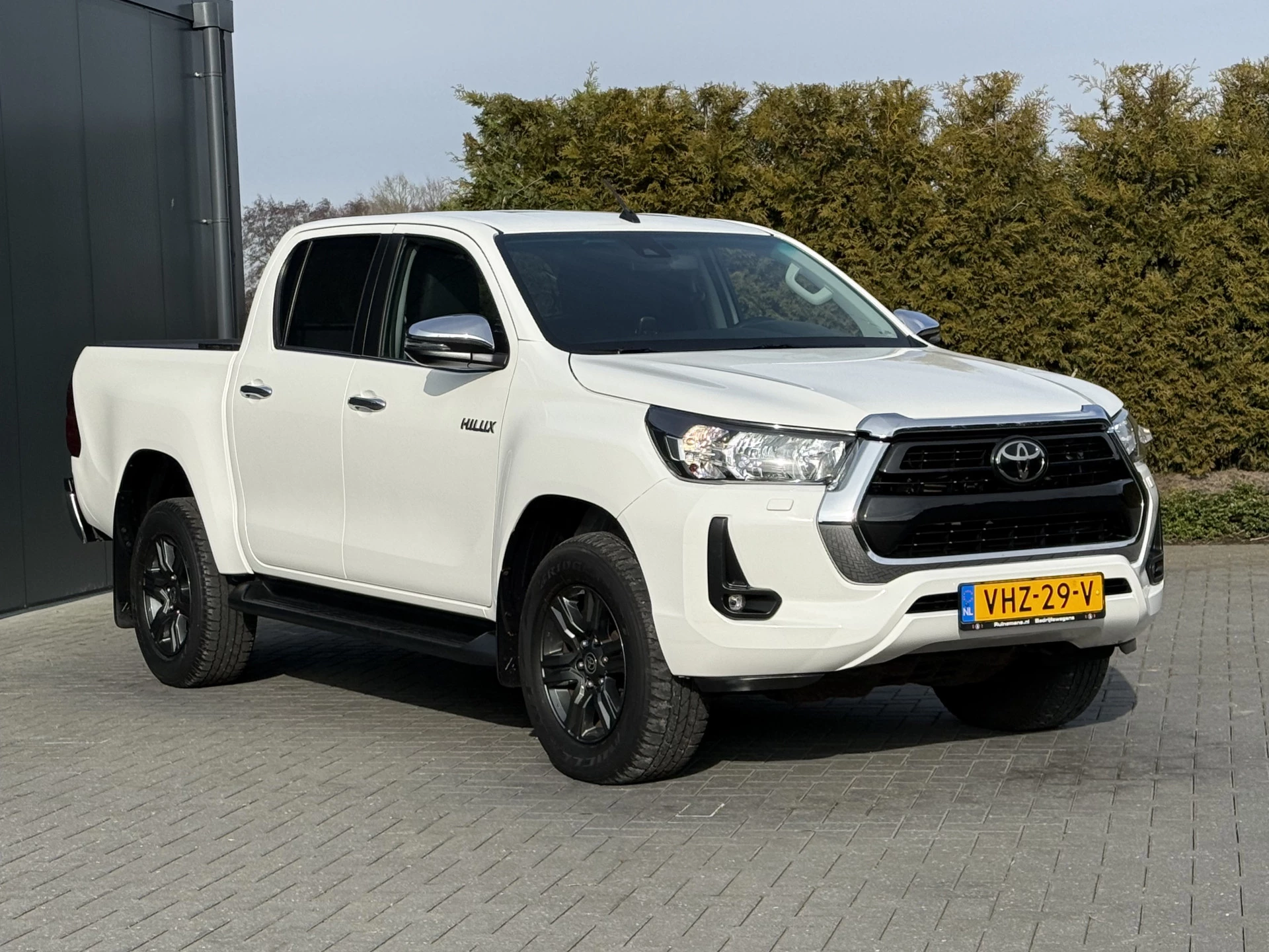 Toyota Hilux 2021 - 2.4 D-4D AUTOMAAT / 4x4 / 1e EIG. / 3.500 KG AHG / CAMERA / TREKHAAK / ECC / CRUISE / CARPLAY zdjęcie 4