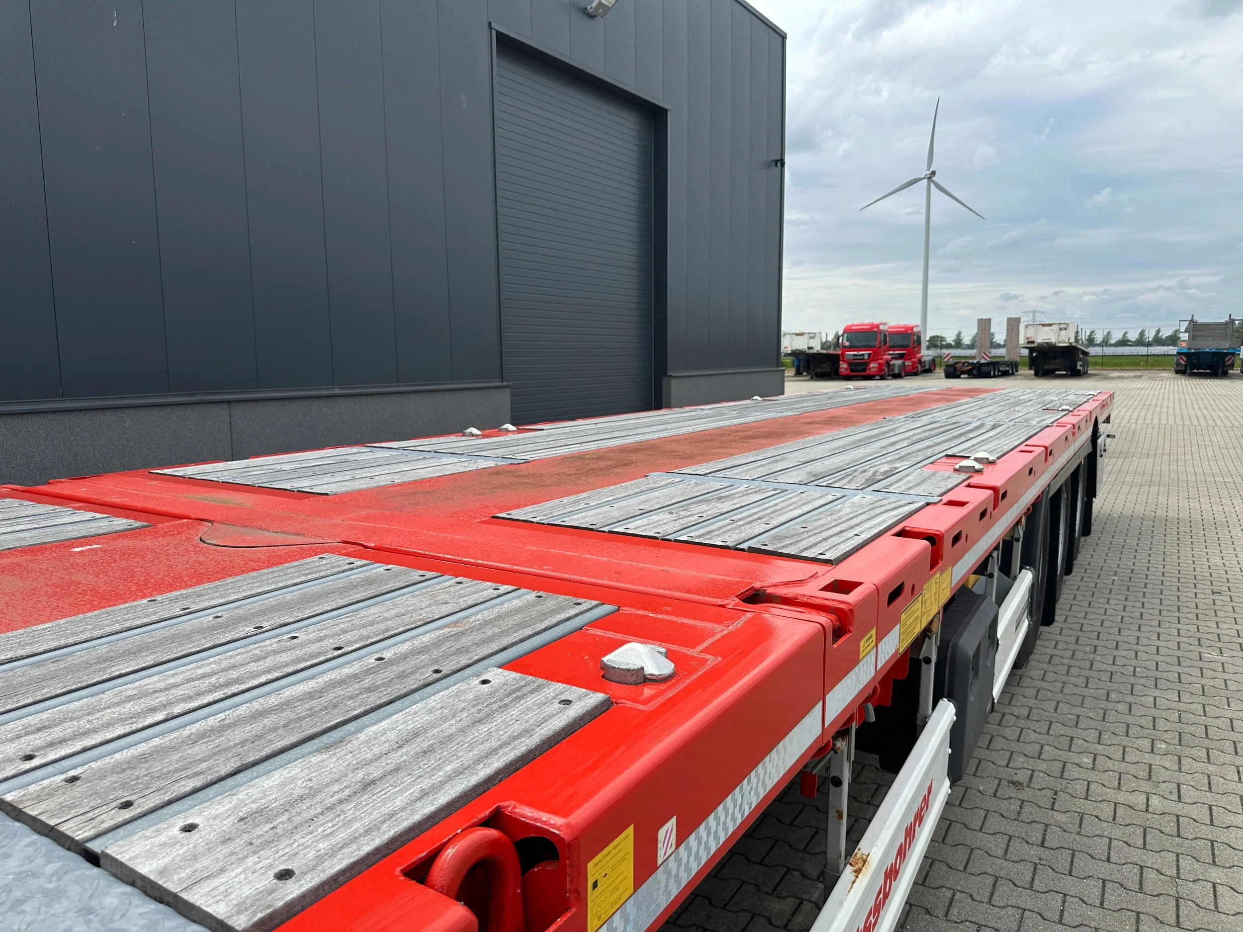 KAESSBOHRER 2026 - new and unused Heavy-Duty flatbed / 690cm extendable / steering axle / lift axle / twistlocks / timberstakes / NL-trailer / APK: 04-2027 zdjęcie 22