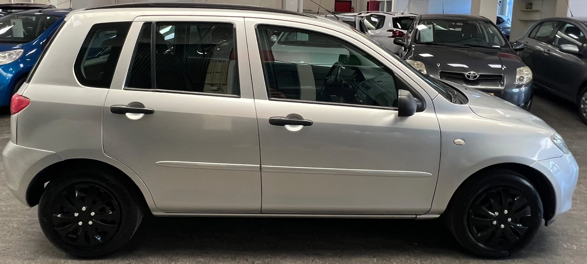 Mazda 2 2004 - 1.4 Exclusive - 2e eigenaar – Airco – 4 nieuwe banden – NAP – Rijklaar. afbeelding 10