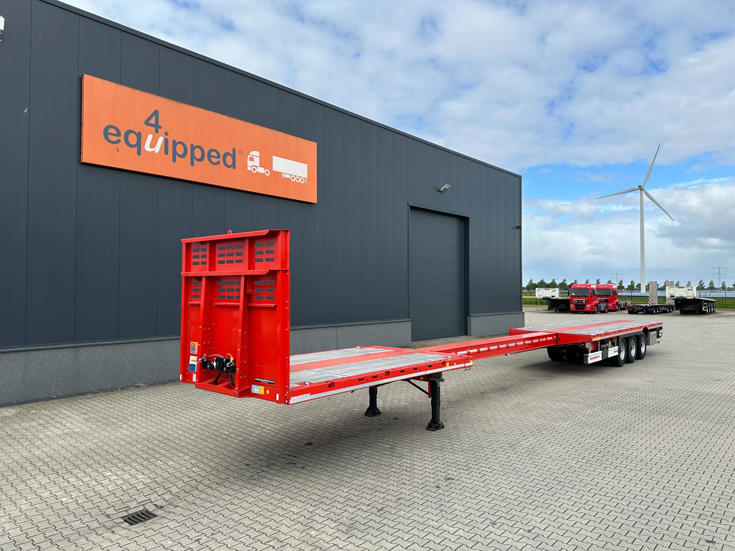 Kässbohrer 2026 - new and unused Heavy-Duty flatbed / 690cm extendable / steering axle / lift axle / twistlocks / timberstakes / NL-trailer / APK: 04-2027 afbeelding 1