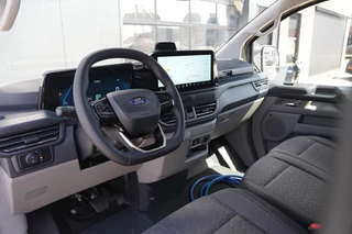 Ford E-Transit Custom 2026 - 340 L2H1 Limited 71 kWh 218pk | 2x Schuif | DDS LED | 360 Camera | B&O | ACC | Navi | Verwarmd stuurwiel | Elek trekhaak | AGR-stoel | Rijklaar immagine 16