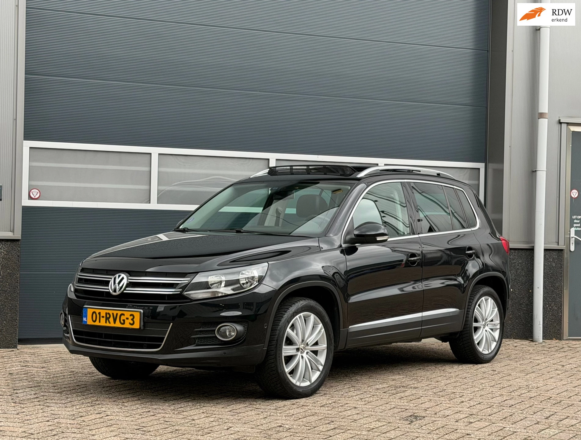 Volkswagen Tiguan 2011 - 2.0 TSI Sport&Style 4Motion bj.2011 Autom|Pano|Trekh|Navi. afbeelding 1