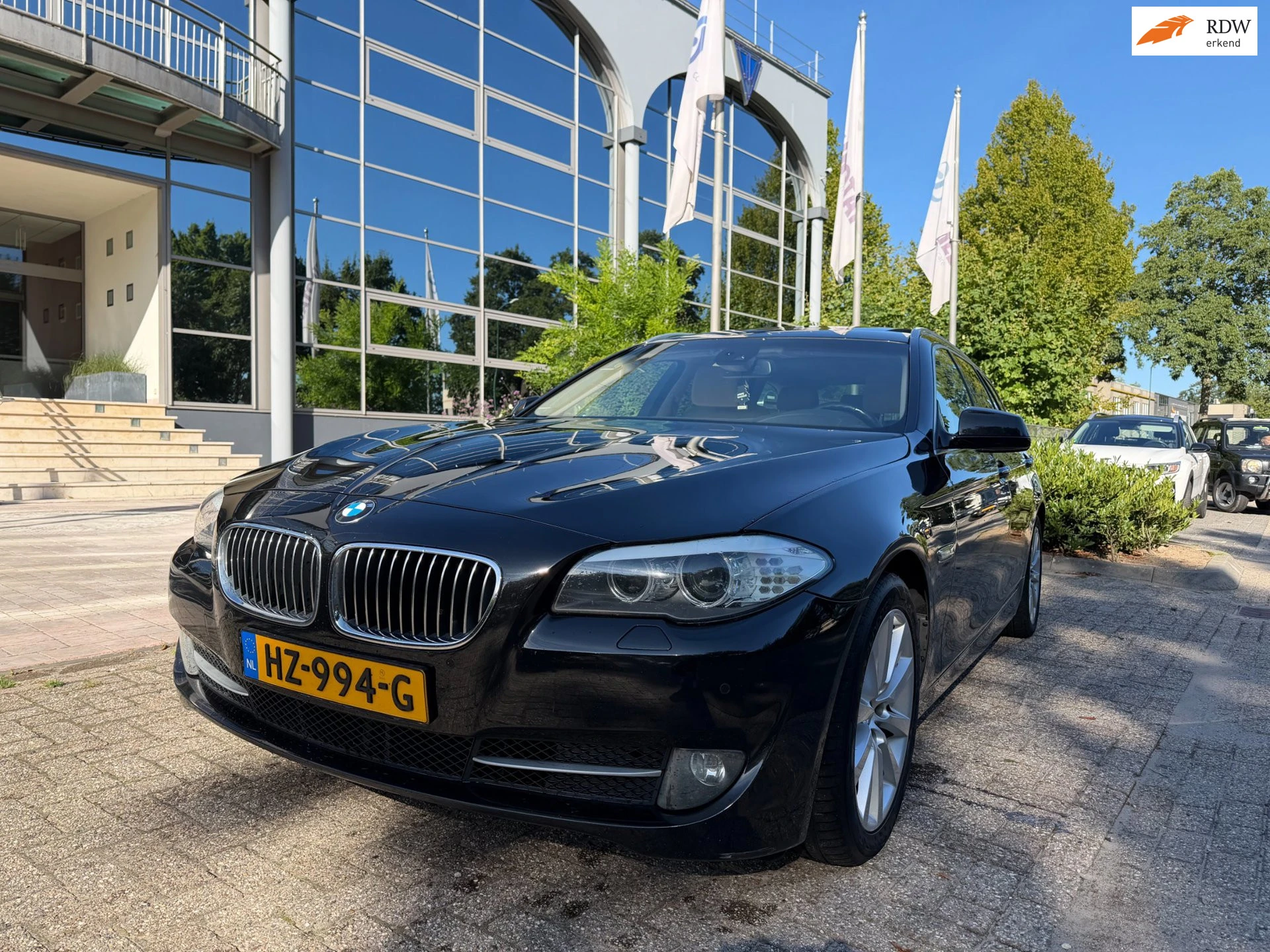BMW 5 Serie 2011 - Touring 523i High exe aut panorama/leer,navi,boekjes afbeelding 1