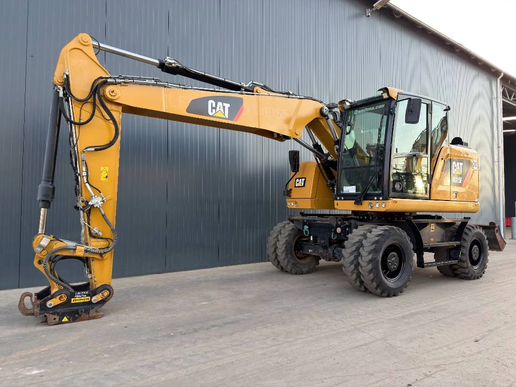 Cat 2017 - M315F - With OilQuick afbeelding 1