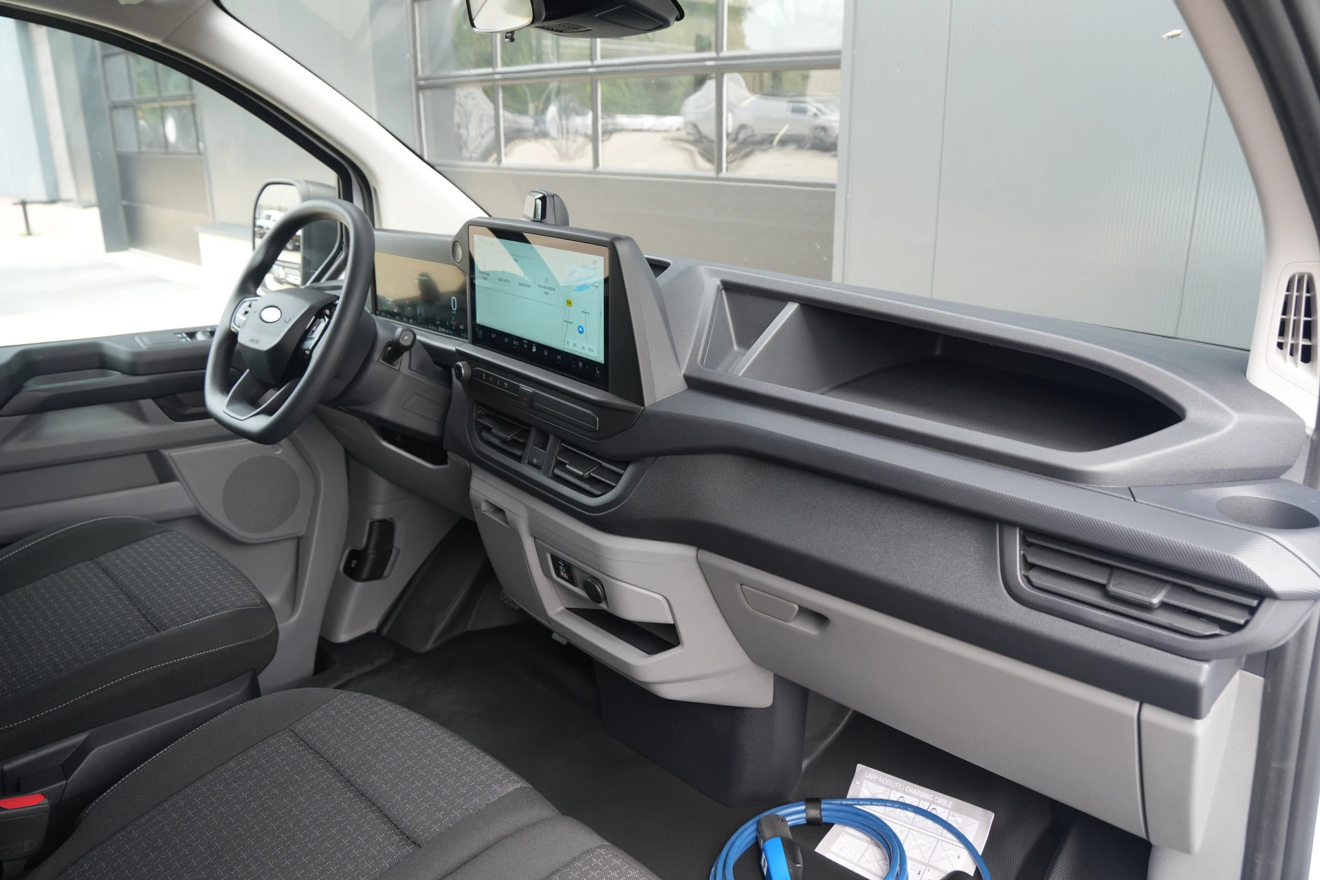 Ford Transit Custom 2026 - 340 2.5 PHEV L2H1 Kombi Trend 9 zits - Carplay - Camera - Navigatie - Airco achterin - Cuise - Rijklaar afbeelding 37