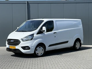 Ford Transit Custom 2020 - 2.0 TDCI 130 PK / L2H1 / AUTOMAAT / TREKHAAK / AIRCO / CRUISE / CAMERA / 3-ZITS / LED / STOEL -EN VOORRUIT VERWARMING afbeelding 2 miniatuur