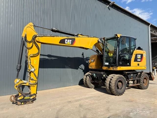 Cat N/A 2017 - M315F - With OilQuick image 1