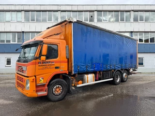 Volvo 340 2009 - FM 6X2 DHOLLANDIA 2000 KG CURTAINS image 1