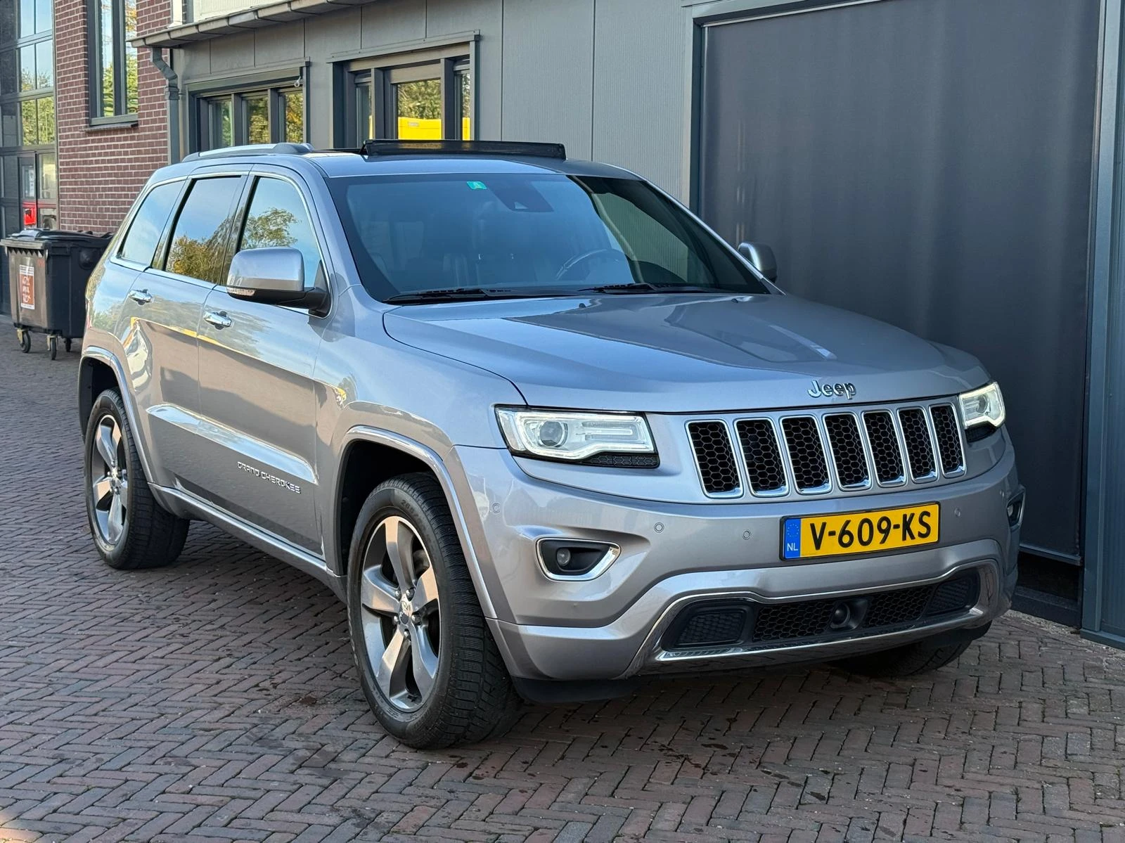 Jeep Grand Cherokee 2014 - 3.0 V6 4x4 Grijskenteken Pano Luchtvering Stoelverwarm/ventil. Leer Trekhaak afbeelding 1