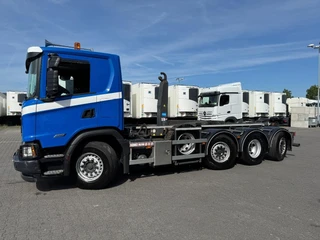 Scania G 2024 - G560XT 8X2 30 T HOOKLIFT 10 TONS FRONTAXLE ,TOPCONDITION te koop