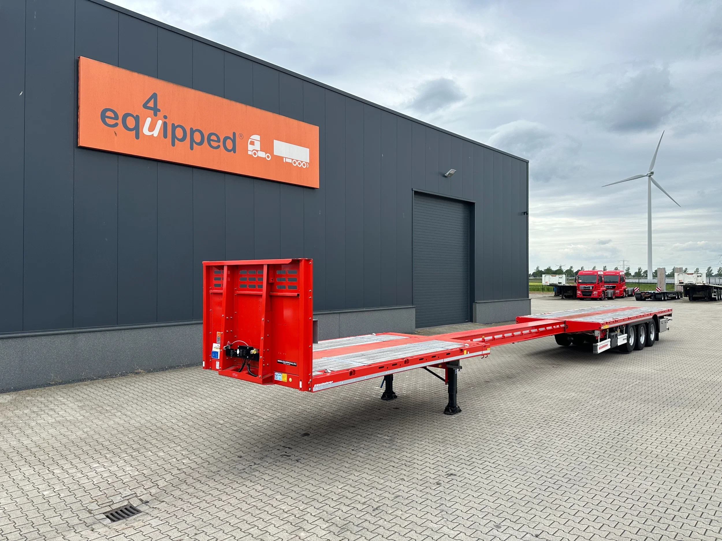 KAESSBOHRER 2026 - new and unused Heavy-Duty flatbed / 690cm extendable / steering axle / lift axle / twistlocks / timberstakes / NL-trailer / APK: 04-2027 Bild 1