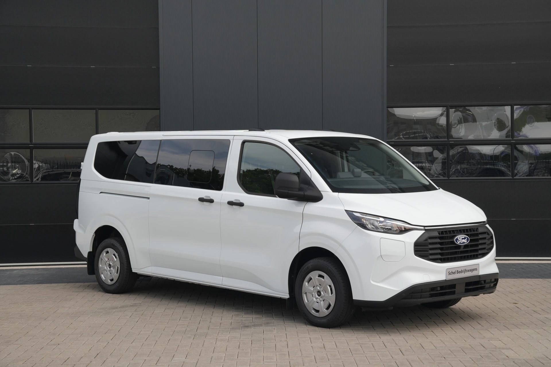Ford Transit Custom 2026 - 340 2.5 PHEV L2H1 Kombi Trend 9 zits - Carplay - Camera - Navigatie - Airco achterin - Cuise - Rijklaar afbeelding 3