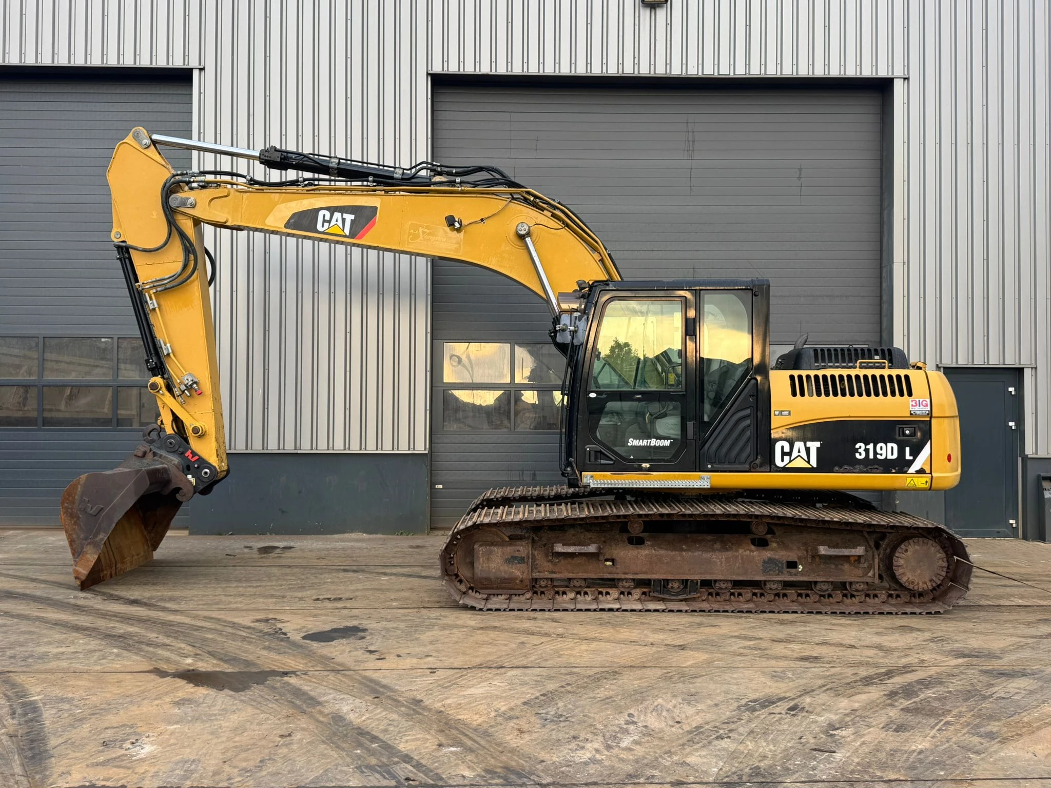 Caterpillar 319DL 2011 afbeelding 1
