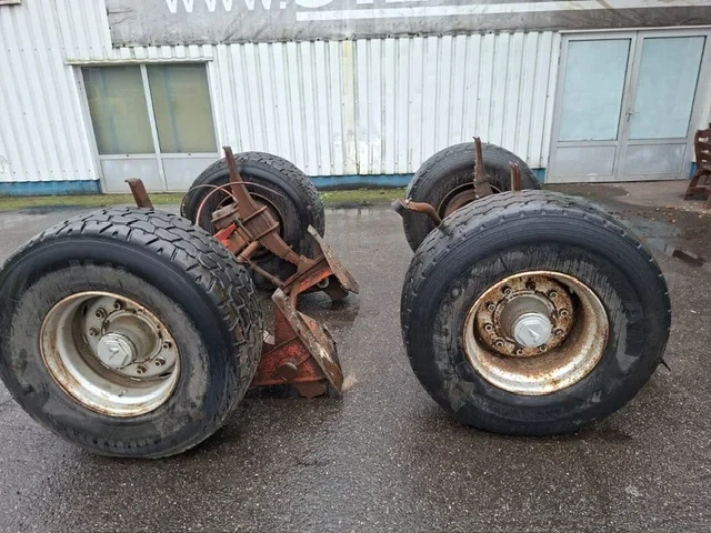 Fruehauf - 2 Trailer Axles on Spring suspension , with 4 nice tyres image 1