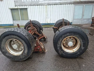 Fruehauf - 2 Trailer Axles on Spring suspension , with 4 nice tyres for sale