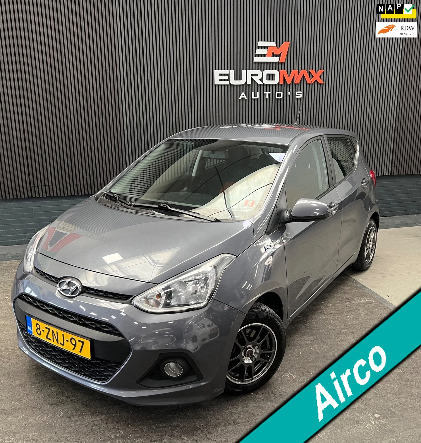 Hyundai i10 2015 - 1.0i Go! Airco - Nav - NAP - Cruise Cntrl - Bleutooth - Start/Stop - Goed onderhouden auto afbeelding 1