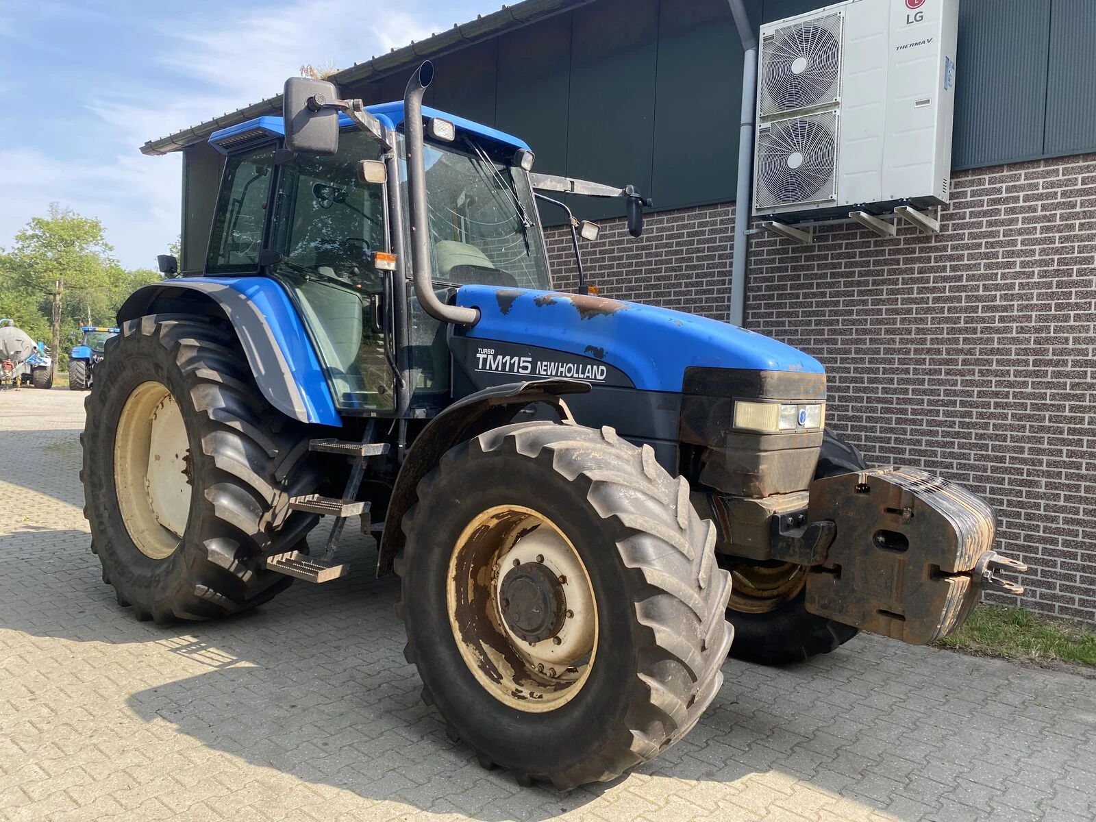 New Holland TM115 2002 afbeelding 1