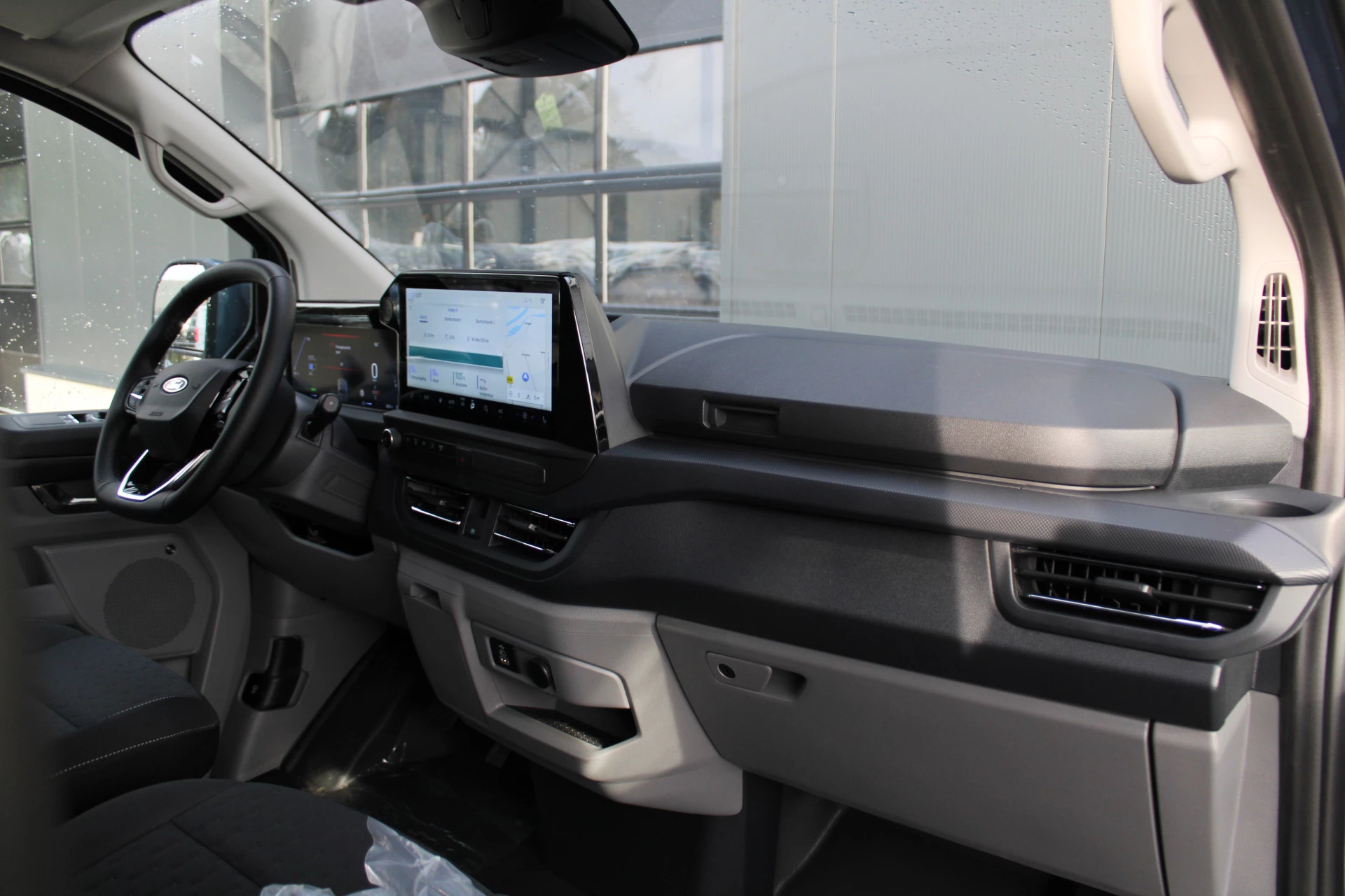 Ford E-Transit Custom 2025 - 340 L2H1 Limited 65 kWh 218pk - 2x Schuif - LED - 360 Camera - B&O - ACC - Navi - Stoel/Stuurverwarming - Rijklaar afbeelding 49