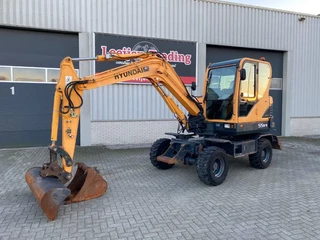 Hyundai N/A 2013 - Robex 55W-9 wheeled excavator, 2013 year, Airconditioning !! image 1