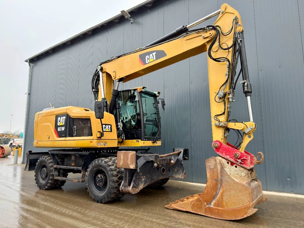 Cat 2015 - M318F afbeelding 59