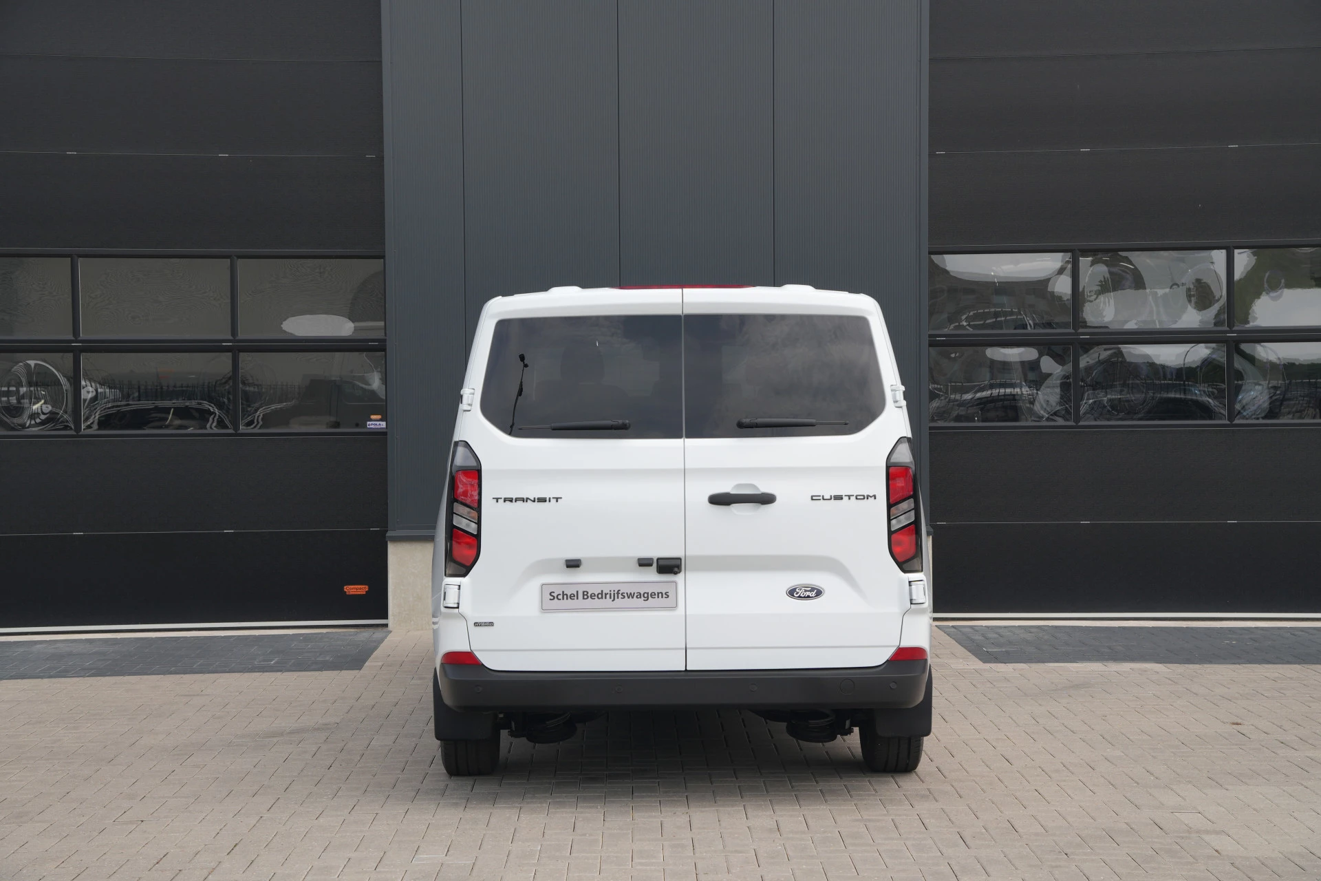 Ford Transit Custom 2026 - 340 2.5 PHEV L2H1 Kombi Trend 9 zits - Carplay - Camera - Navigatie - Airco achterin - Cuise - Rijklaar afbeelding 6