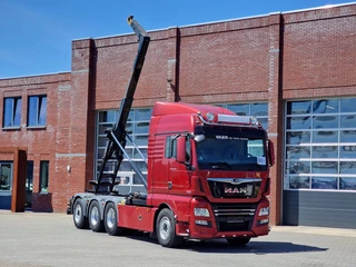 MAN TGX 2018 - 35.500 8x4*4 - Hyva Hooklift - Custom interior - Steering axle rear - Euro 6 te koop