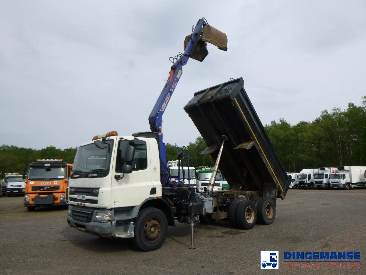 DAF CF 75.310 6x4 RHD tipper + HMF 1144 K-1 + grapple 2008 imagen 1