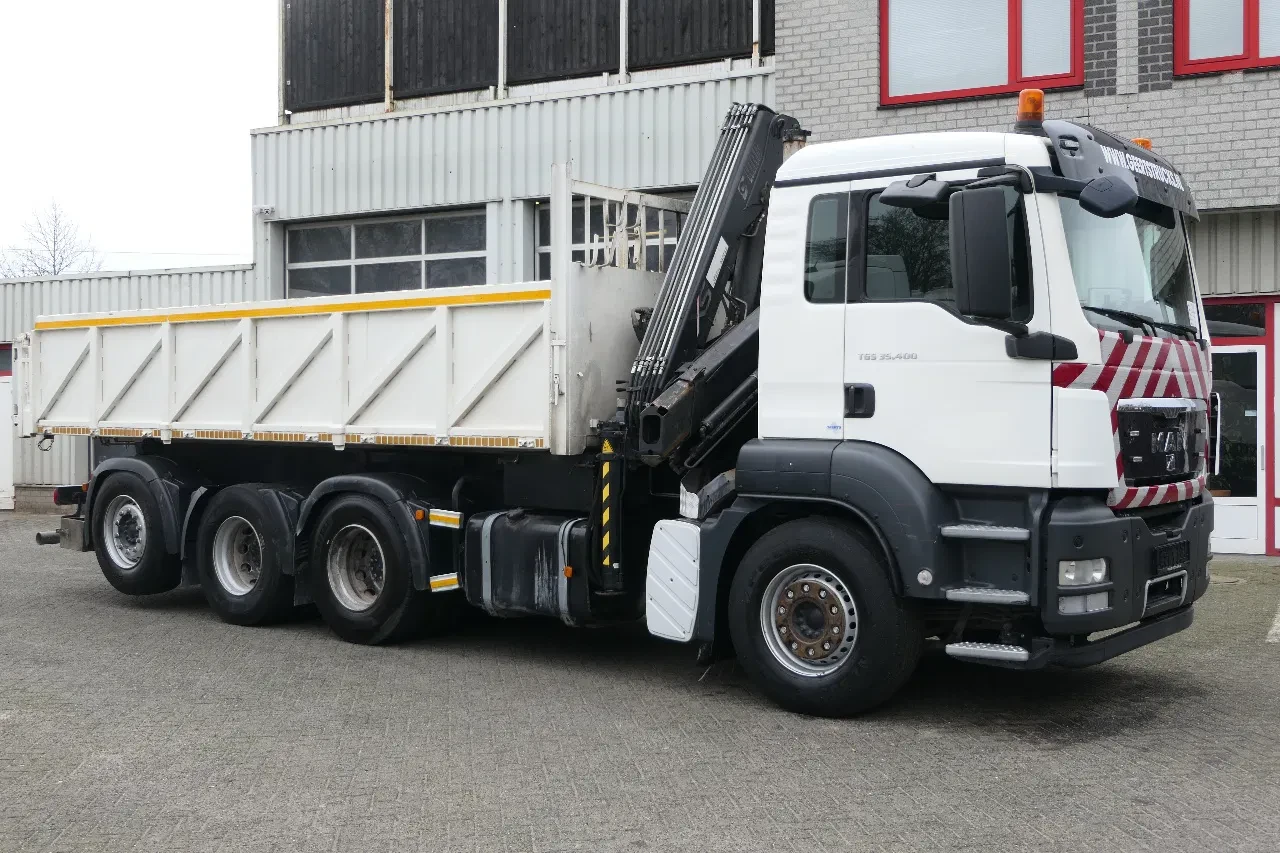 MAN TGS 2009 - 35.400 | 8X4 | HIAB 144 BS-3 DUO + Remote Control | 25Ton Tipper | 468407Km | 2009 | Euro4 | Belgium Truck afbeelding 1
