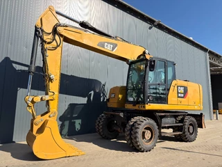 Cat N/A 2014 - M320F obrazek 1