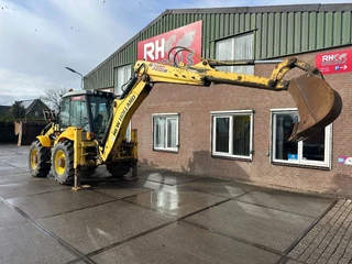 New Holland N/A 2011 - LB115B, CE, 240 MM MULTI PURPOSE LOADER BUCKET, 800 MM BACHOE DIGGING BUCKET, FLIP OVER FORKS, AIR CONDITIONER immagine 13