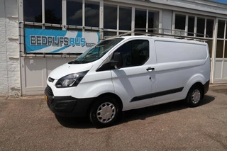 Ford Transit Custom 2015 - 2.2 TDCI L1H1 | AIRCO | BIJRIJDERSBANK | TREKHAAK | IMPERIAAL изображение 1