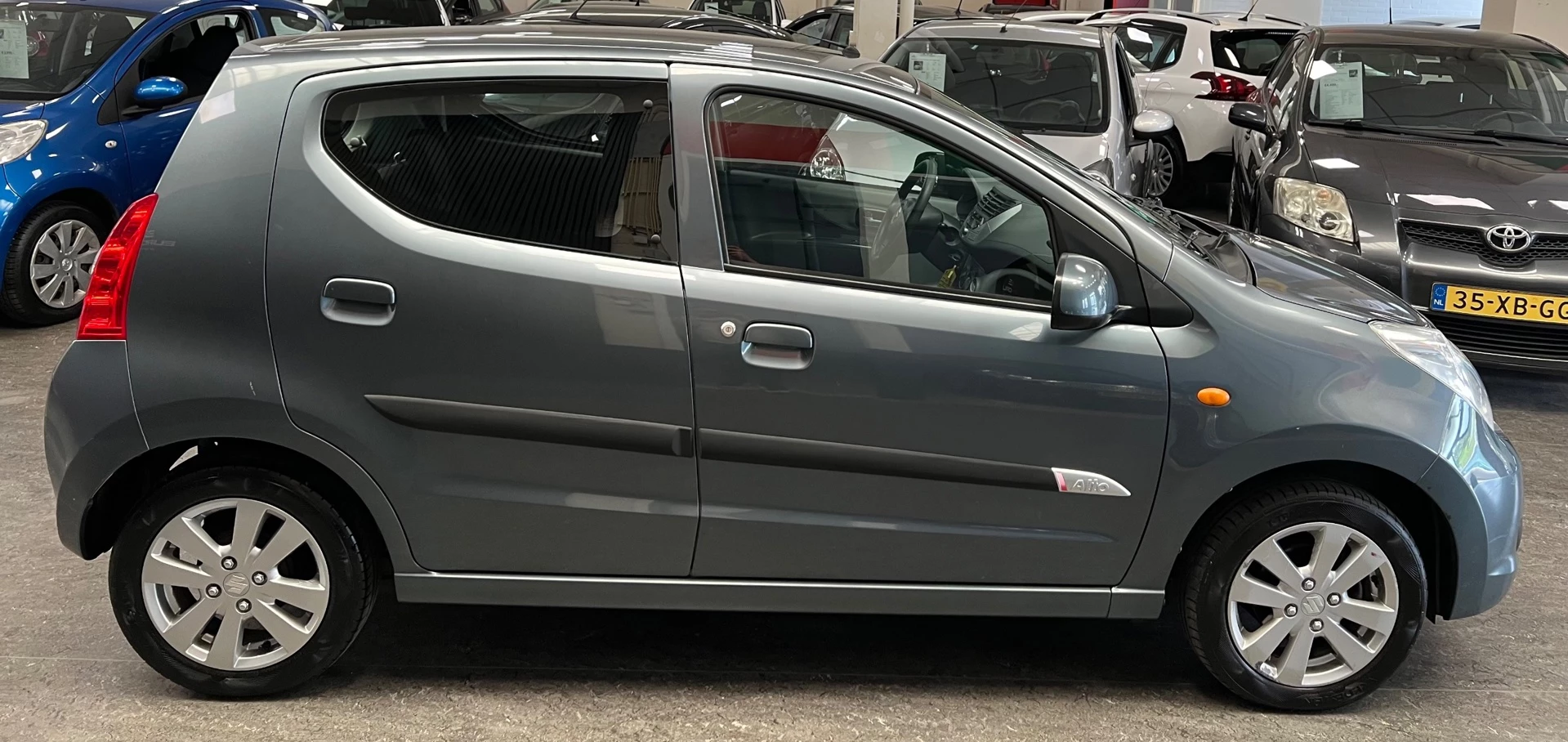 Suzuki Alto 2011 - 1.0 Exclusive - 2e eigenaar - Nette auto afbeelding 11