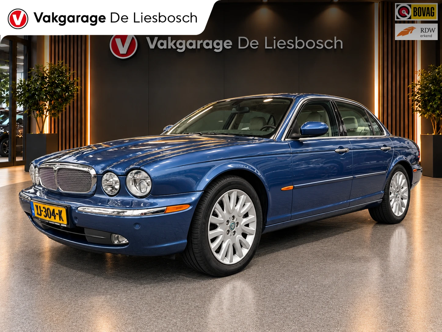 Jaguar XJ 2004 - 4.2 V8 Super charge leer/schuifdak/boeken/stoelverw/navi/alpine afbeelding 1