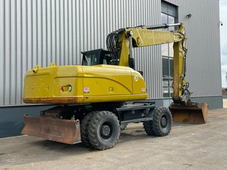 Caterpillar M322D 2011 Bild 3 Miniaturansicht
