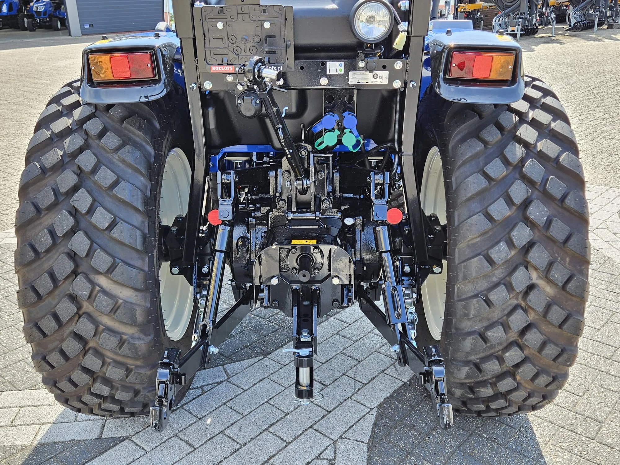 New Holland 2024 - Boomer 55 HST met voorlader en Kemp balenprikker afbeelding 15