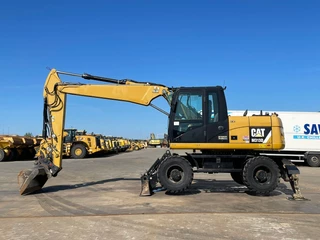 Caterpillar M313D VA - Outriggers + Blade 2012 - N/A imagen 1