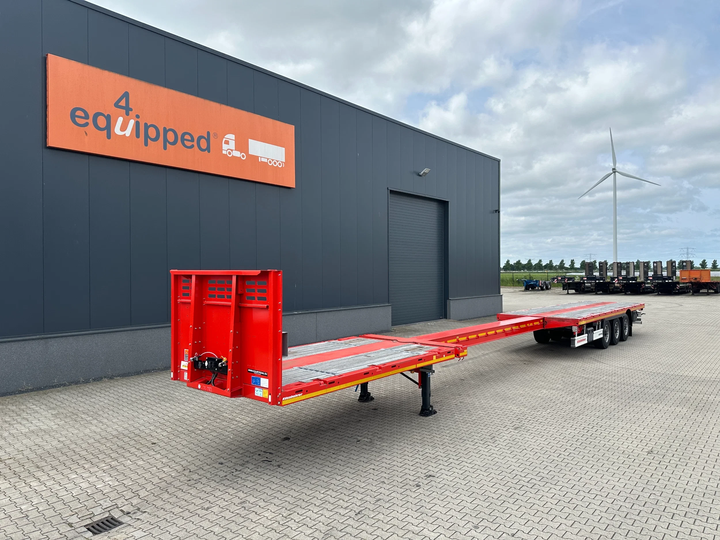 KAESSBOHRER 2026 - new and unused Heavy-Duty flatbed / 690cm extendable / steering axle / discbrakes / NL-trailer / APK: 04-2027 imagen 1