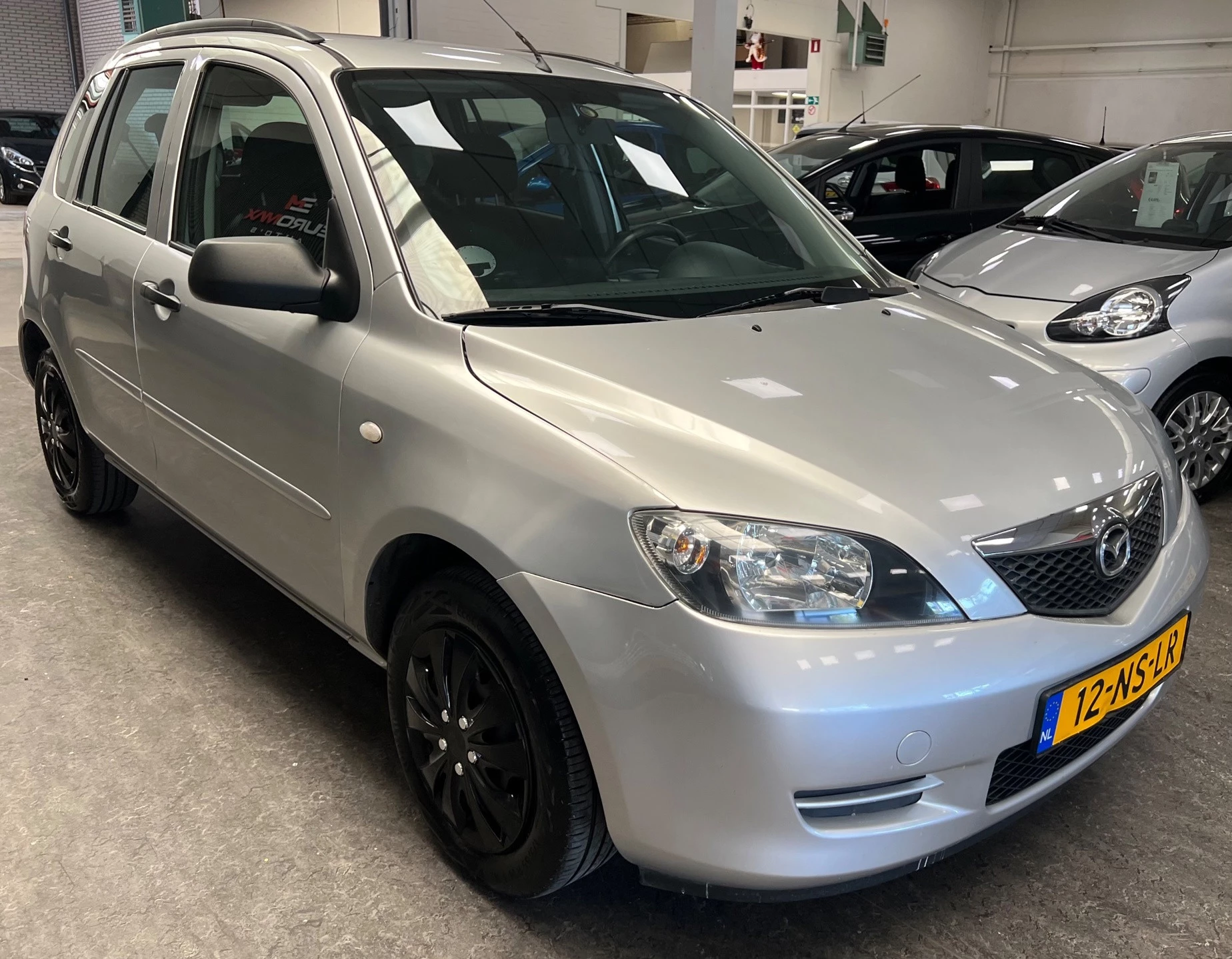 Mazda 2 2004 - 1.4 Exclusive - 2e eigenaar – Airco – 4 nieuwe banden – NAP – Rijklaar. afbeelding 11