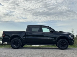 Dodge Ram 1500 2023 - REBEL GT 5.7L V8 WIDEBODY, ORIG NED, TRX STYLE, HUD, PANO, H&K, LUCHTV, DIGITAL MIRROR, CUT-OUT, CAI, PADDLE SHIFT изображение 3 миниатюра