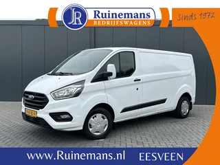Ford Transit Custom 2021 - 2.0 TDCI / L2H1 / 1e EIG. / CAMERA / CARPLAY / AIRCO / CRUISE / VOORRUITVERW / 3 ZITS / PDC / 2.800 KG AHG en venta