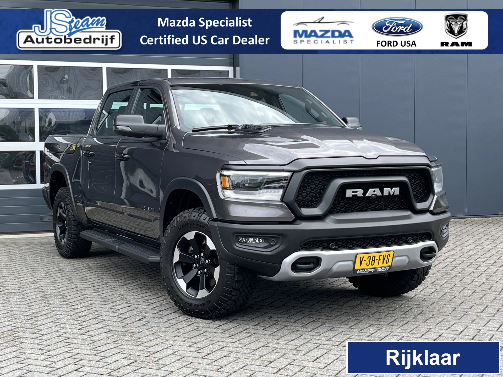Dodge Ram Pick-Up 2024 - 5.7i V8 HEMI eTorque 400PK CREW CAB REBEL GT | BPM VRIJ | RAMBOX | LUCHTVERING | LPG | LAADBAKKLEP | TREKHAAK | PANODAK | 360CAM | DIGITAAL DASHBOARD afbeelding 1