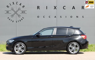 BMW 1 Series 2017 - 116i Centennial High Executive AllSeason Dakspoiler !!NIEUWBINNEN!! image 1