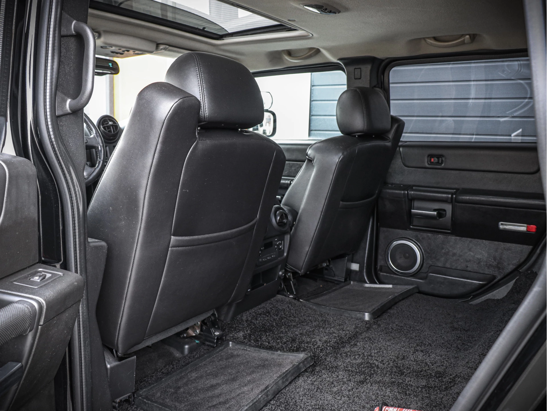 Hummer H2 2005 - 6.0L V8 | Zwart leder | Schuif Kanteldak | image 11