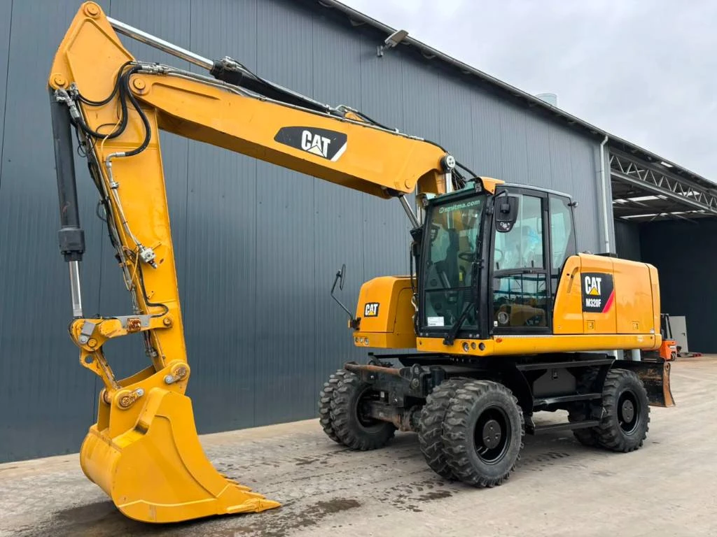 Cat 2014 - M320F afbeelding 1